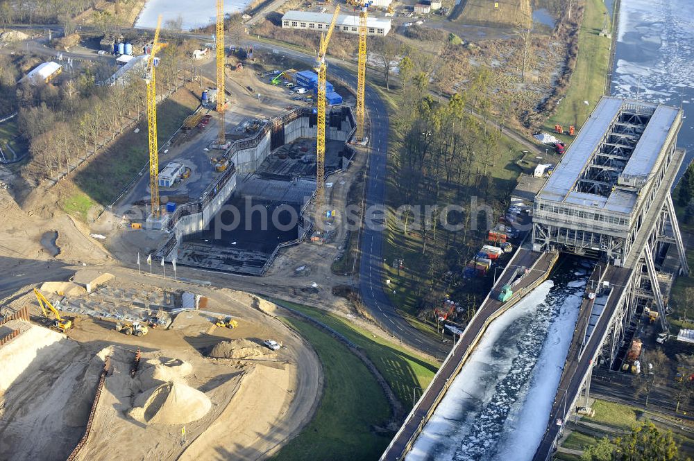 Niederfinow from above - Blick auf die Baustelle des Neubaus des Schiffshebewerkes Niederfinow Nord durch die DSD Brückenbau GmbH, die Johann Bunte Bauunternehmung GmbH & Co. KG , Bilfinger Berger Ingenieurbau GmbH und die Siemag GmbH. Look at the new building of the boat lift Niederfinow North Bridge. The new building needed because the old boat lift of 1934 has now reached the end of its life. To maintain the function of the Havel-Oder waterway, it must therefore be replaced by a new building on schedule.