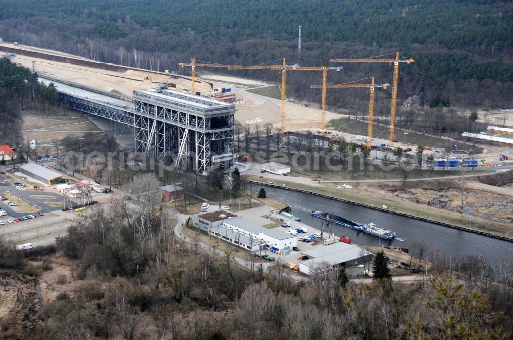 Niederfinow from the bird's eye view: Blick auf die Baustelle des Neubaus des Schiffshebewerkes Niederfinow Nord durch die DSD Brückenbau GmbH, die Johann Bunte Bauunternehmung GmbH & Co. KG , Bilfinger Berger Ingenieurbau GmbH und die Siemag GmbH. Look at the new building of the boat lift Niederfinow North Bridge. The new building needed because the old boat lift of 1934 has now reached the end of its life. To maintain the function of the Havel-Oder waterway, it must therefore be replaced by a new building on schedule.