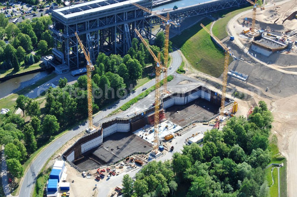 Aerial image Niederfinow - Blick auf die Baustelle des Neubaus des Schiffshebewerkes Niederfinow Nord durch die DSD Brückenbau GmbH, die Johann Bunte Bauunternehmung GmbH & Co. KG , Bilfinger Berger Ingenieurbau GmbH und die Siemag GmbH. Look at the new building of the boat lift Niederfinow North Bridge. The new building needed because the old boat lift of 1934 has now reached the end of its life. To maintain the function of the Havel-Oder waterway, it must therefore be replaced by a new building on schedule.