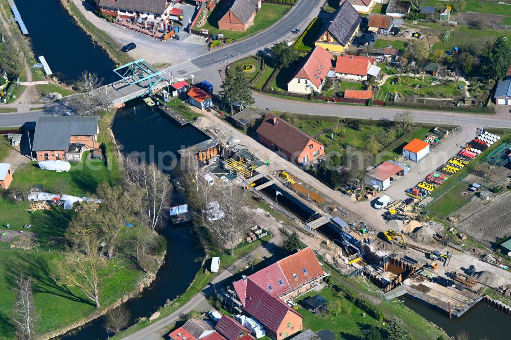 Banzkow from above - Construction site for the new construction and expansion of the lock systems and replacement construction of the weir system on the banks of the Stoerkanal waterway in Banzkow in the state Mecklenburg-West Pomerania, Germany