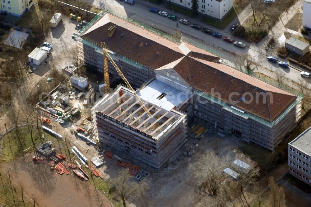 Berlin from above - Construction site of school building of the Gebrueder-Montgolfier-Gymnasium on Ellernweg in the district Schoeneweide in Berlin, Germany