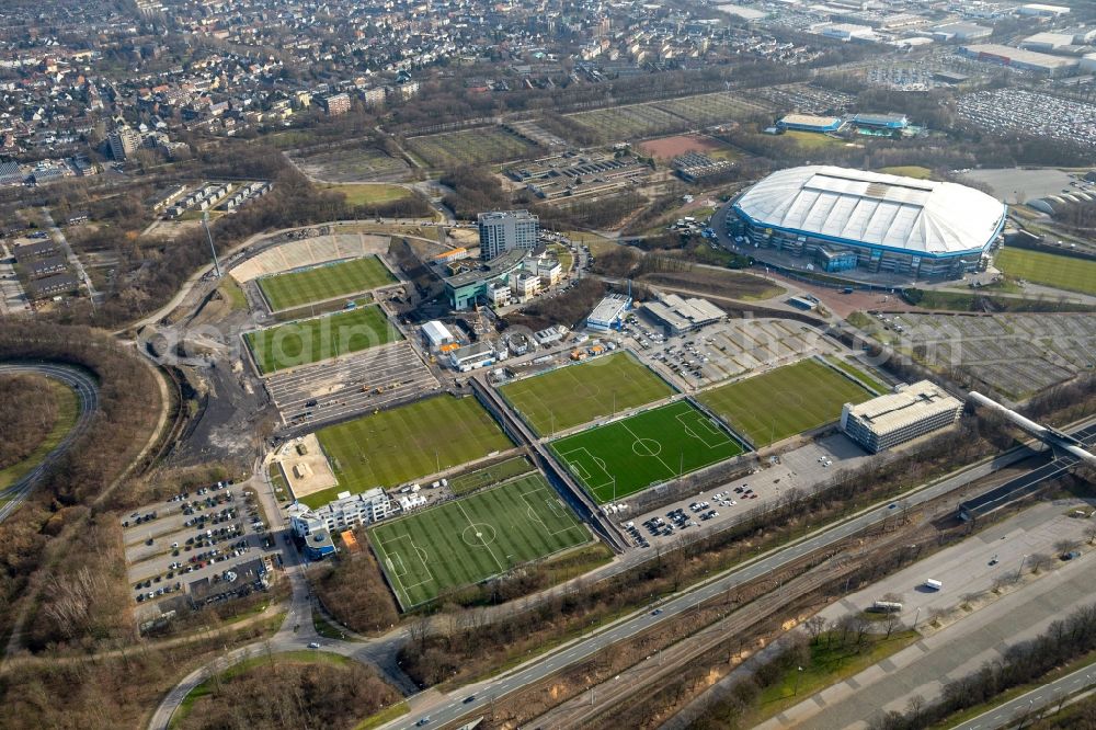 Gelsenkirchen from above - Construction of new Ensemble of sports grounds of FC Gelsenkirchen-Schalke 04 e.V. between the Ernst-Kuzorra-Weg and of the Parkallee in the district Gelsenkirchen-Ost in Gelsenkirchen in the state North Rhine-Westphalia, Germany. With a view of the building complex of the Hotel Courtyard Gelsenkirchen 