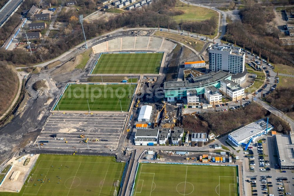 Aerial photograph Gelsenkirchen - Construction of new Ensemble of sports grounds of FC Gelsenkirchen-Schalke 04 e.V. between the Ernst-Kuzorra-Weg and of the Parkallee in the district Gelsenkirchen-Ost in Gelsenkirchen in the state North Rhine-Westphalia, Germany. With a view of the building complex of the Hotel Courtyard Gelsenkirchen 