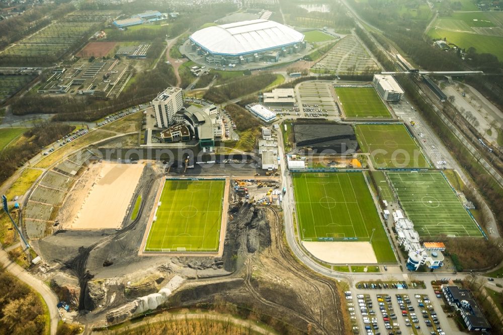 Aerial photograph Gelsenkirchen - Construction of new Ensemble of sports grounds of FC Gelsenkirchen-Schalke 04 e.V. between the Ernst-Kuzorra-Weg and of the Parkallee in the district Gelsenkirchen-Ost in Gelsenkirchen in the state North Rhine-Westphalia, Germany. With a view of the building complex of the Hotel Courtyard Gelsenkirchen 