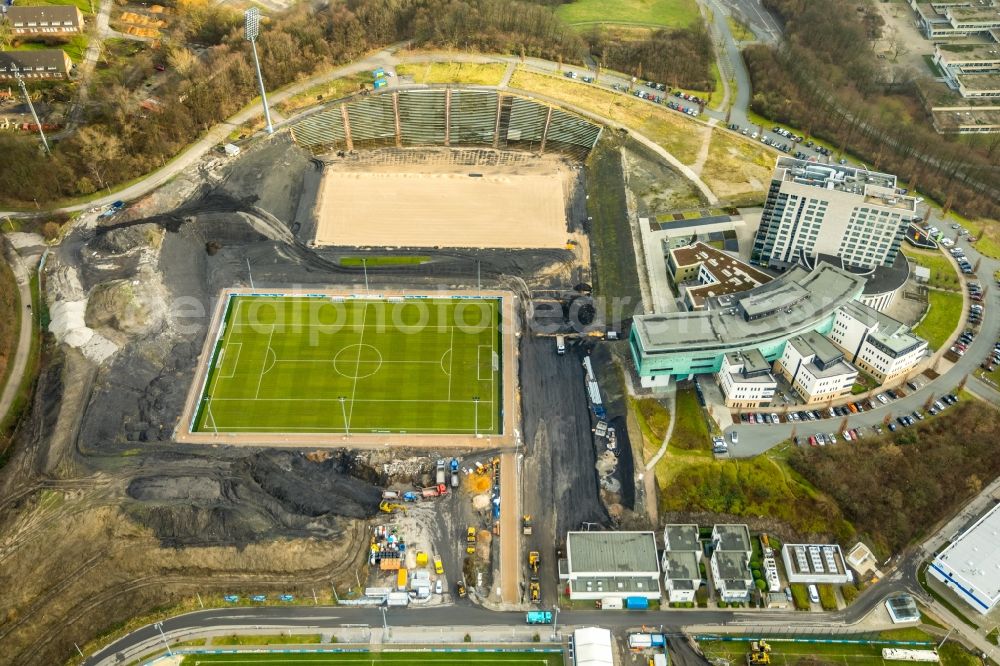 Aerial image Gelsenkirchen - Construction of new Ensemble of sports grounds of FC Gelsenkirchen-Schalke 04 e.V. between the Ernst-Kuzorra-Weg and of the Parkallee in the district Gelsenkirchen-Ost in Gelsenkirchen in the state North Rhine-Westphalia, Germany. With a view of the building complex of the Hotel Courtyard Gelsenkirchen 