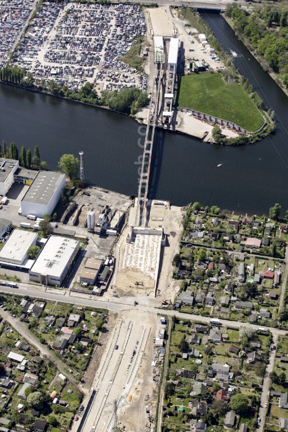 Berlin from above - River - bridge construction over the Spree as part of the South-East-Connection (SOV) in the area of Schoeneweide in Berlin in Germany. The new bridge will connect Koepenicker Landstrasse and Rummelsburger Strasse