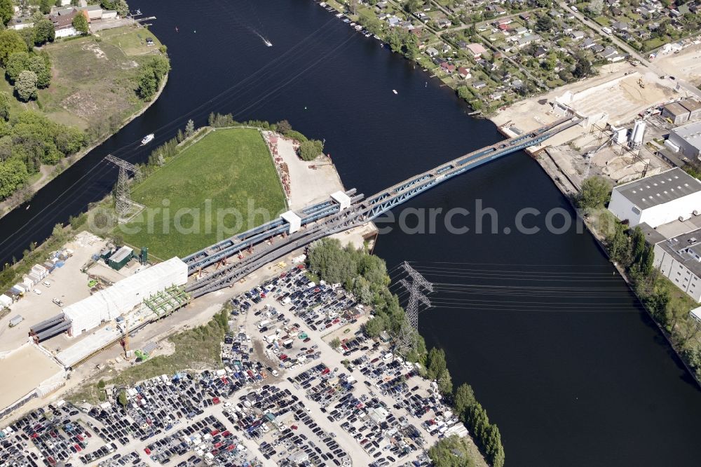 Aerial image Berlin - River - bridge construction over the Spree as part of the South-East-Connection (SOV) in the area of Schoeneweide in Berlin in Germany. The new bridge will connect Koepenicker Landstrasse and Rummelsburger Strasse