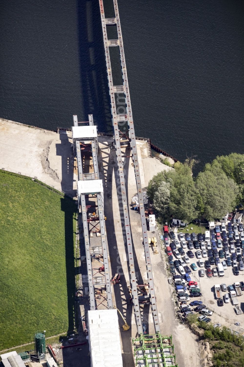 Berlin from above - River - bridge construction over the Spree as part of the South-East-Connection (SOV) in the area of Schoeneweide in Berlin in Germany. The new bridge will connect Koepenicker Landstrasse and Rummelsburger Strasse