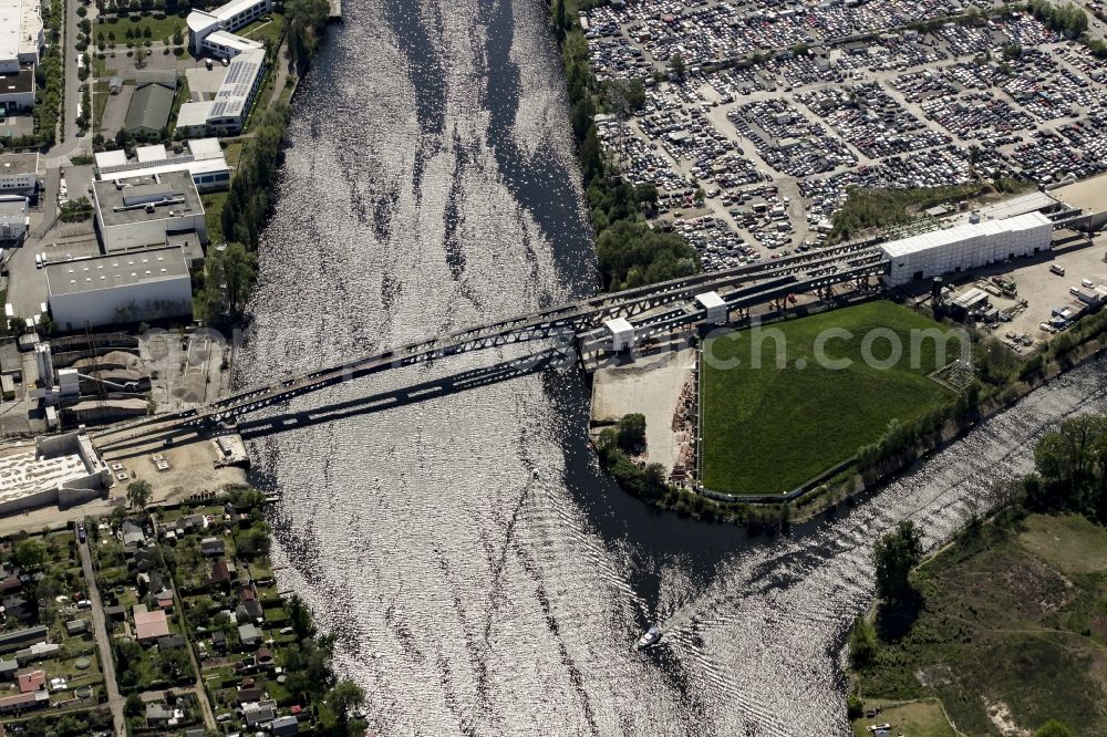 Aerial image Berlin - River - bridge construction over the Spree as part of the South-East-Connection (SOV) in the area of Schoeneweide in Berlin in Germany. The new bridge will connect Koepenicker Landstrasse and Rummelsburger Strasse