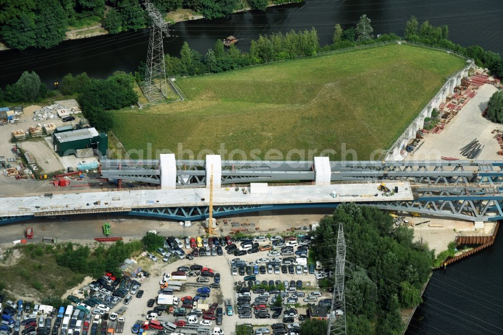 Aerial image Berlin - River - bridge construction over the Spree as part of the South-East-Connection (SOV) in the area of Schoeneweide in Berlin in Germany. The new bridge will connect Koepenicker Landstrasse and Rummelsburger Strasse