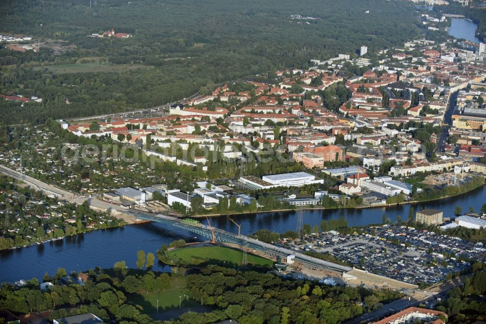 Aerial image Berlin - River - bridge construction over the Spree as part of the South-East-Connection (SOV) in the area of Schoeneweide in Berlin in Germany. The new bridge will connect Koepenicker Landstrasse and Rummelsburger Strasse