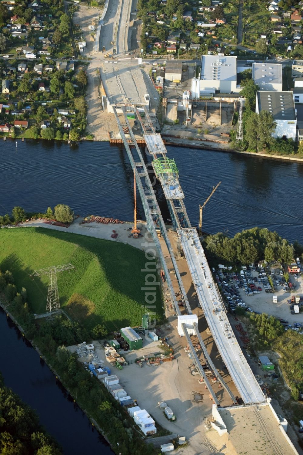 Aerial photograph Berlin - River - bridge construction over the Spree as part of the South-East-Connection (SOV) in the area of Schoeneweide in Berlin in Germany. The new bridge will connect Koepenicker Landstrasse and Rummelsburger Strasse