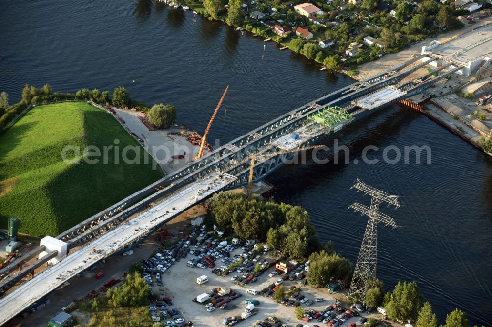 Berlin from the bird's eye view: River - bridge construction over the Spree as part of the South-East-Connection (SOV) in the area of Schoeneweide in Berlin in Germany. The new bridge will connect Koepenicker Landstrasse and Rummelsburger Strasse