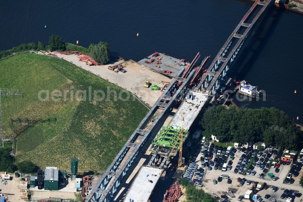 Aerial photograph Berlin - River - bridge construction over the Spree as part of the South-East-Connection (SOV) in the area of Schoeneweide in Berlin in Germany. The new bridge will connect Koepenicker Landstrasse and Rummelsburger Strasse