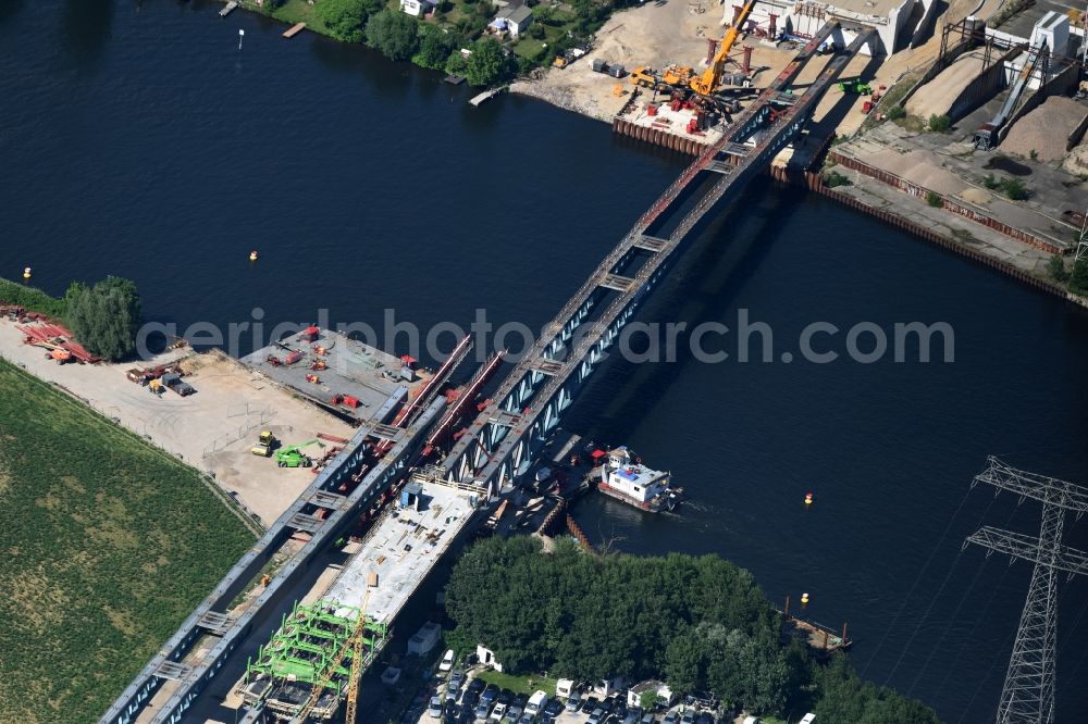 Berlin from above - River - bridge construction over the Spree as part of the South-East-Connection (SOV) in the area of Schoeneweide in Berlin in Germany. The new bridge will connect Koepenicker Landstrasse and Rummelsburger Strasse