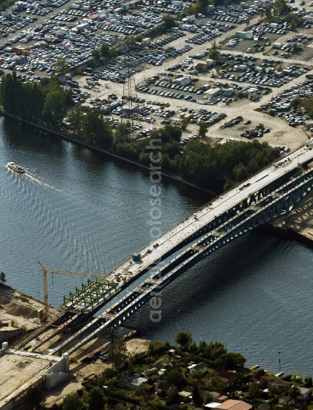 Aerial image Berlin - River - bridge construction over the Spree as part of the South-East-Connection (SOV) in the area of Schoeneweide in Berlin in Germany. The new bridge will connect Koepenicker Landstrasse and Rummelsburger Strasse