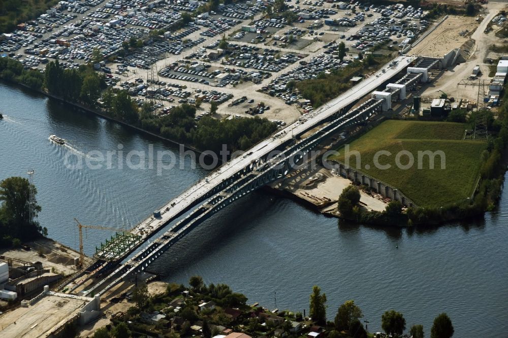 Aerial photograph Berlin - River - bridge construction over the Spree as part of the South-East-Connection (SOV) in the area of Schoeneweide in Berlin in Germany. The new bridge will connect Koepenicker Landstrasse and Rummelsburger Strasse