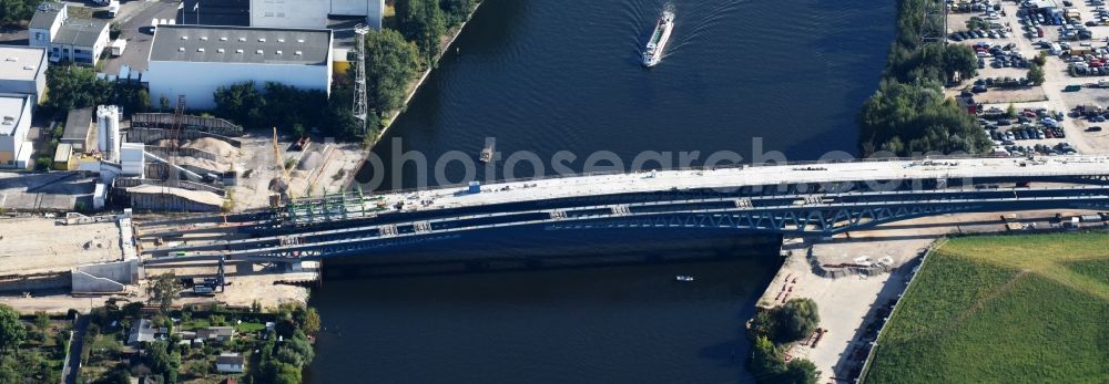 Berlin from above - River - bridge construction over the Spree as part of the South-East-Connection (SOV) in the area of Schoeneweide in Berlin in Germany. The new bridge will connect Koepenicker Landstrasse and Rummelsburger Strasse