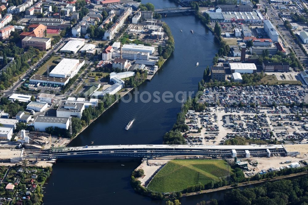 Aerial image Berlin - River - bridge construction over the Spree as part of the South-East-Connection (SOV) in the area of Schoeneweide in Berlin in Germany. The new bridge will connect Koepenicker Landstrasse and Rummelsburger Strasse