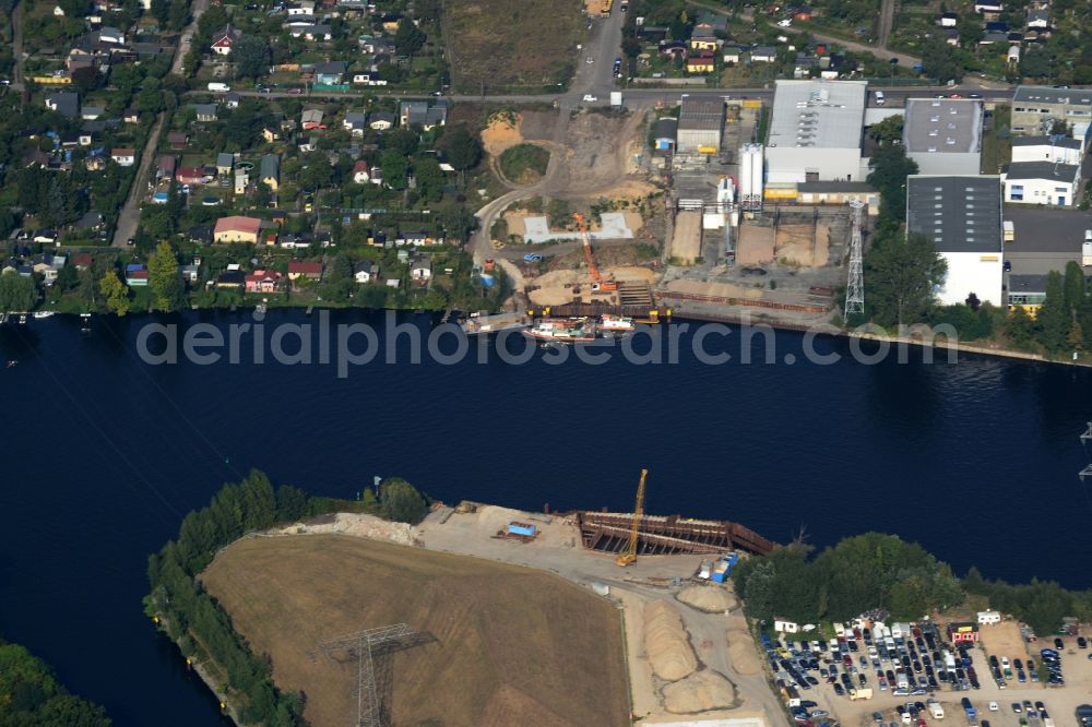 Berlin from the bird's eye view: Construction site for the new building of the Spree bridge on the south-east connection (SOV) in Berlin Schoeneweide