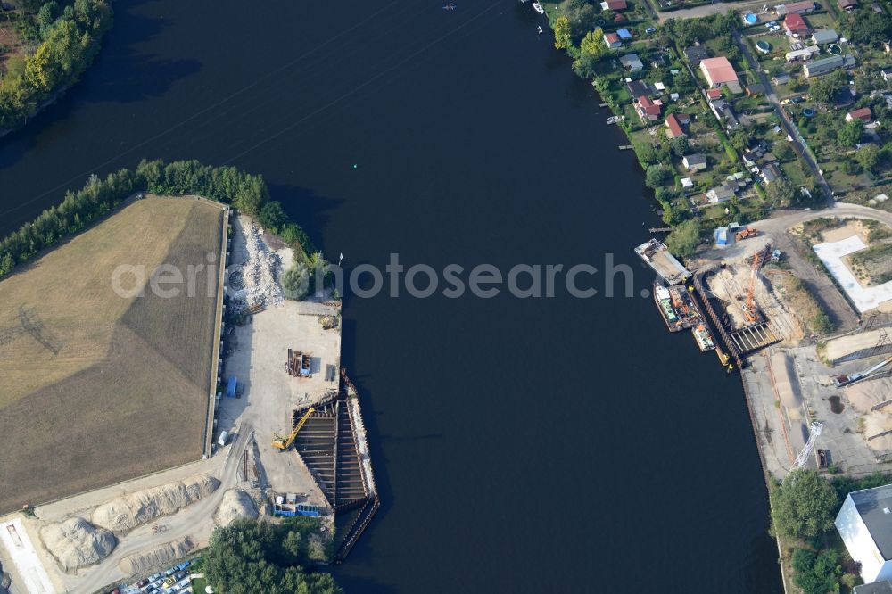 Berlin from the bird's eye view: Construction site for the new building of the Spree bridge on the south-east connection (SOV) in Berlin Schoeneweide