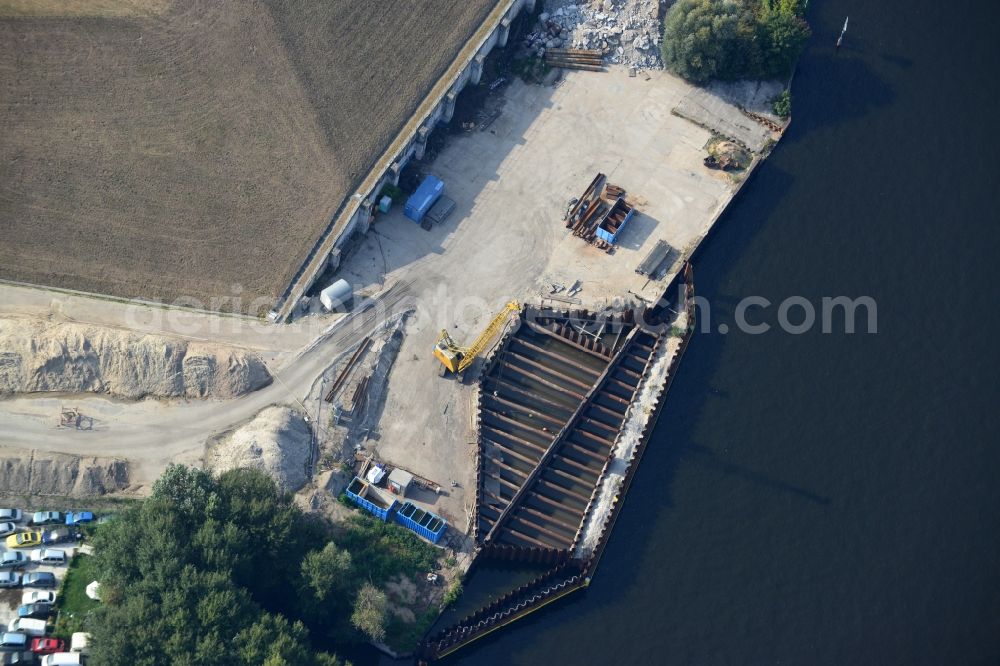 Berlin from the bird's eye view: Construction site for the new building of the Spree bridge on the south-east connection (SOV) in Berlin Schoeneweide