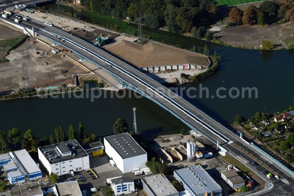 Berlin from the bird's eye view: Construction site for the new building of the Spree bridge on the south-east connection (SOV) in Berlin Schoeneweide