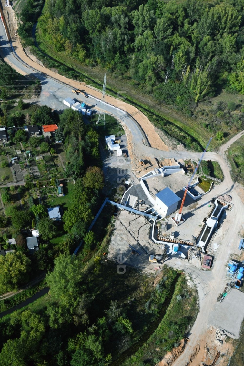 Jeßnitz (Anhalt) from above - Weir on the banks of the flux flow Oestliche Fuhne - Schachtgraben in Jessnitz (Anhalt) in the state Saxony-Anhalt, Germany