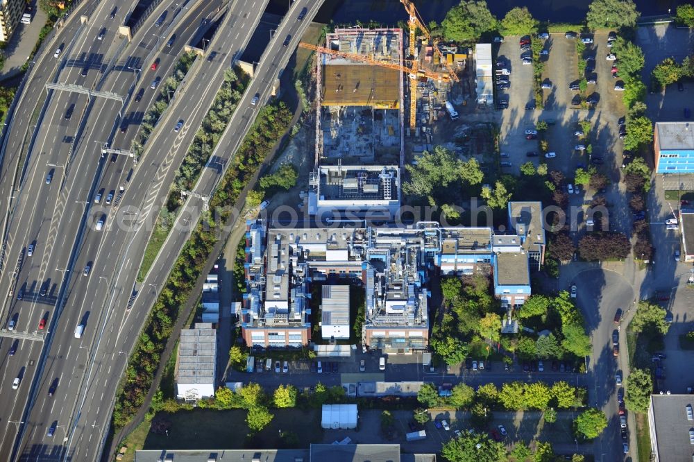 Berlin Neukölln from the bird's eye view: Construction of a new manufacturing sterilization on the premises of BIOTRONIK SE & Co. KG in Woermannkehre in Berlin Neukölln