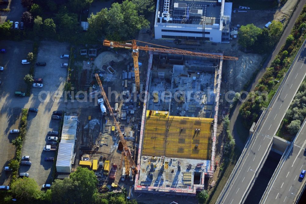 Aerial photograph Berlin Neukölln - Construction of a new manufacturing sterilization on the premises of BIOTRONIK SE & Co. KG in Woermannkehre in Berlin Neukölln