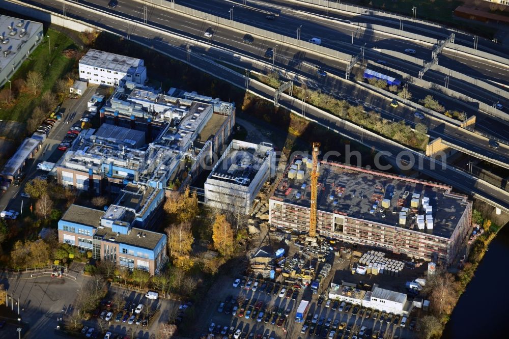 Aerial photograph Berlin - Construction of a new manufacturing sterilization on the premises of BIOTRONIK SE & Co. KG in Woermannkehre in Berlin Neukölln