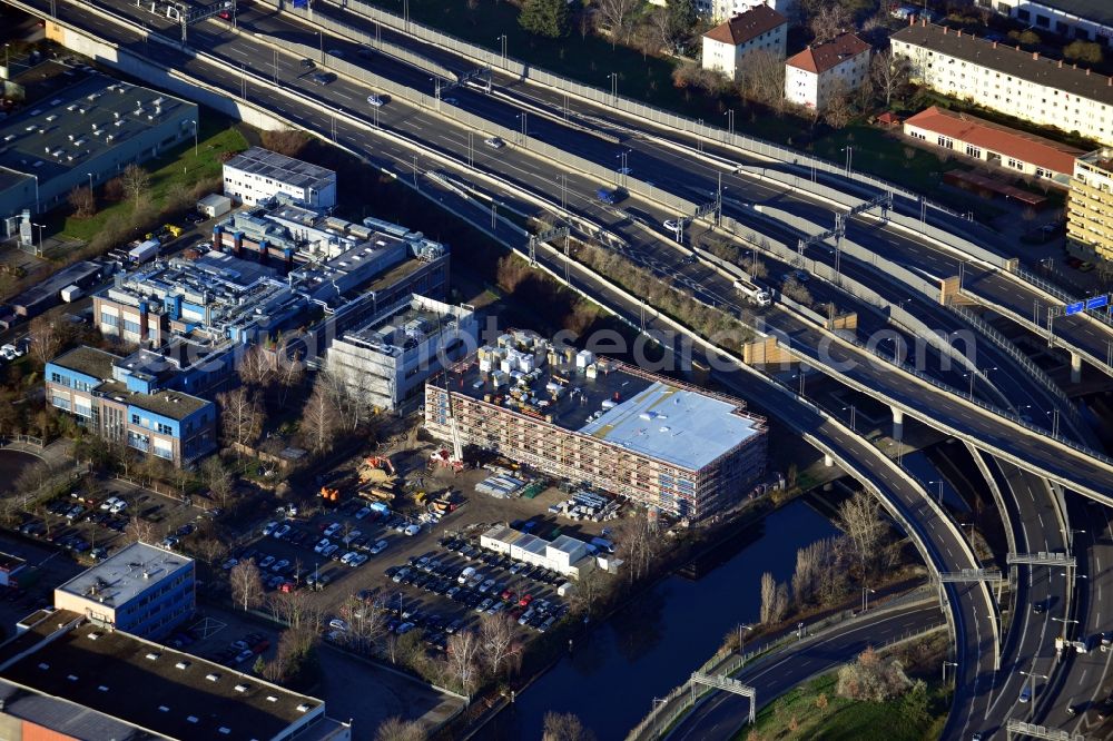 Aerial photograph Berlin - Construction of a new manufacturing sterilization on the premises of BIOTRONIK SE & Co. KG in Woermannkehre in Berlin Neukölln