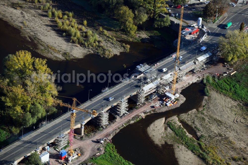 Magdeburg from above - Construction site for the new construction of the road bridges - route and routing of the replacement power bridge train as a pylon bridge named Kaiser-Otto-Bridge and Queen-Editha-Bridge over the Zollelbe and the Alte Elbe on the Mittelstrasse in the district Werder in Magdeburg in the state Saxony- Anhalt, Germany