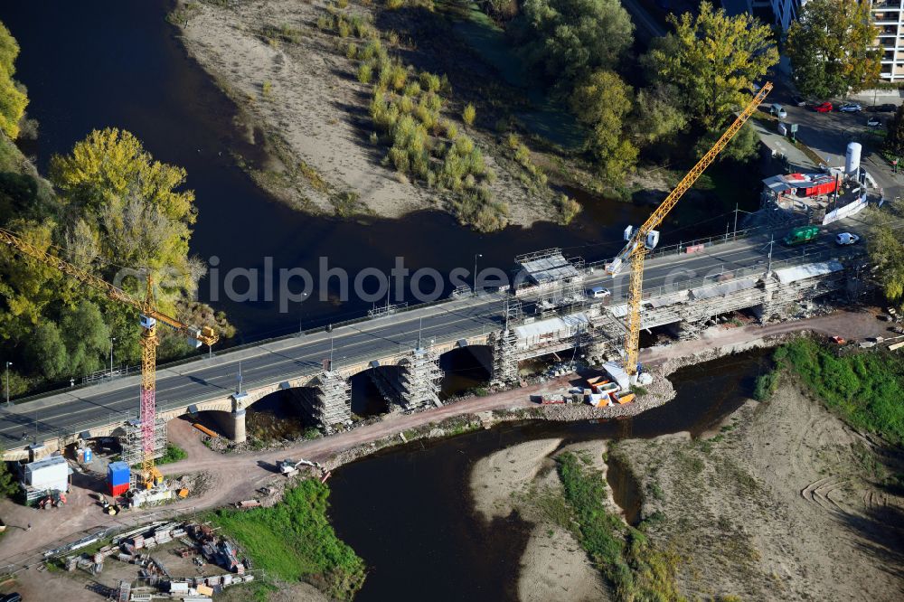 Magdeburg from the bird's eye view: Construction site for the new construction of the road bridges - route and routing of the replacement power bridge train as a pylon bridge named Kaiser-Otto-Bridge and Queen-Editha-Bridge over the Zollelbe and the Alte Elbe on the Mittelstrasse in the district Werder in Magdeburg in the state Saxony- Anhalt, Germany