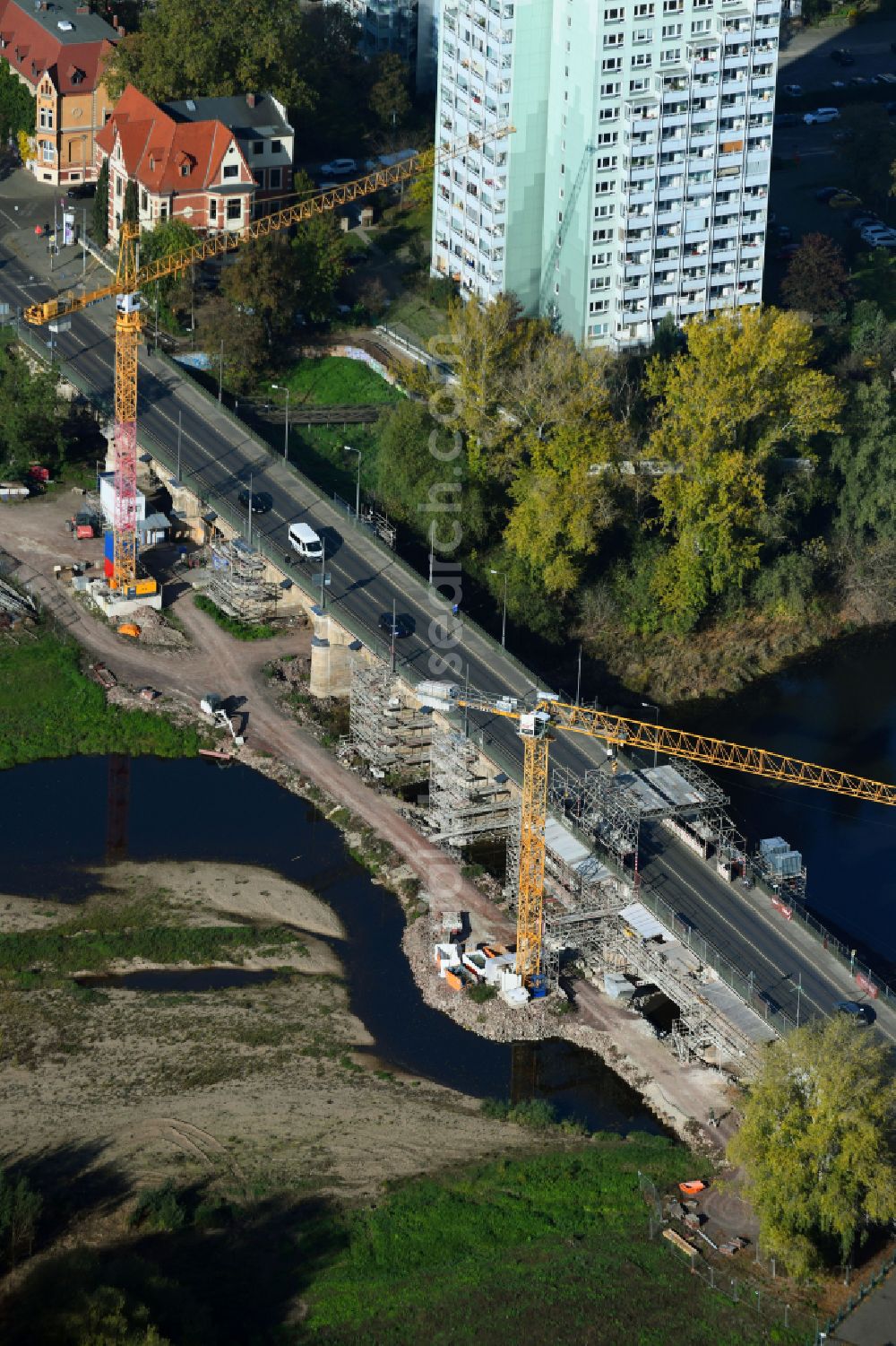 Aerial image Magdeburg - Construction site for the new construction of the road bridges - route and routing of the replacement power bridge train as a pylon bridge named Kaiser-Otto-Bridge and Queen-Editha-Bridge over the Zollelbe and the Alte Elbe on the Mittelstrasse in the district Werder in Magdeburg in the state Saxony- Anhalt, Germany