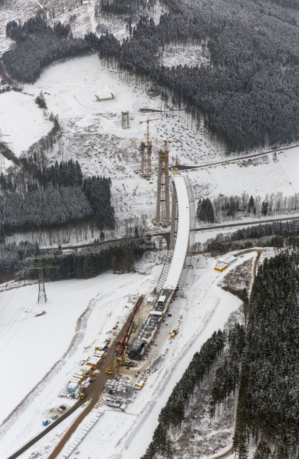 Bestwig from the bird's eye view: Viaduct Nuttlar under construction overlooking the municipality Bestwig in North Rhine-Westphalia