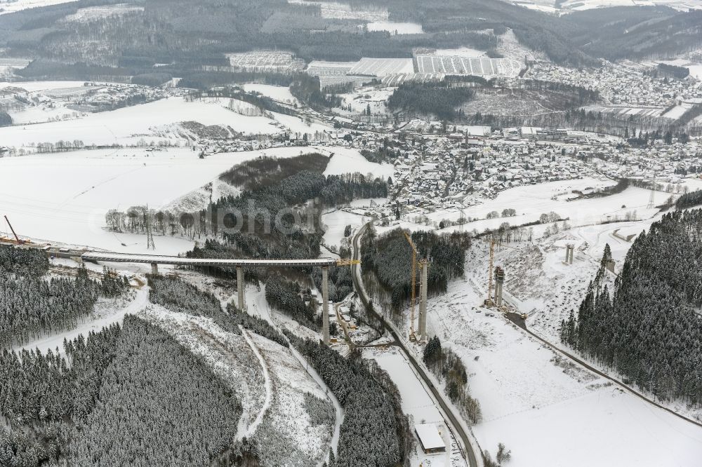 Bestwig from the bird's eye view: Viaduct Nuttlar under construction overlooking the municipality Bestwig in North Rhine-Westphalia