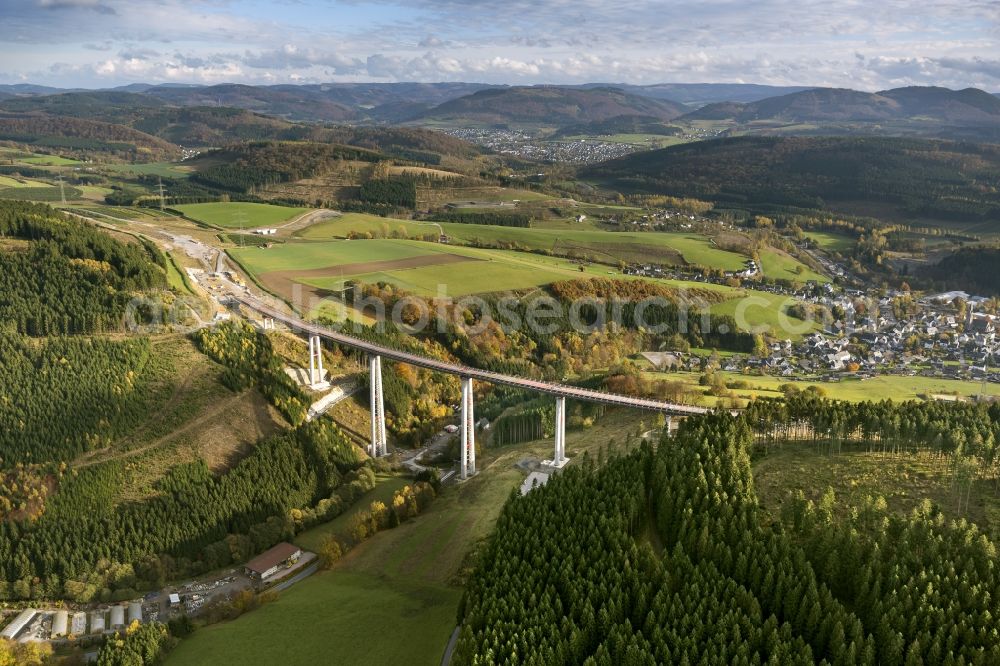 Bestwig from the bird's eye view: Viaduct Nuttlar under construction overlooking the municipality Bestwig in North Rhine-Westphalia