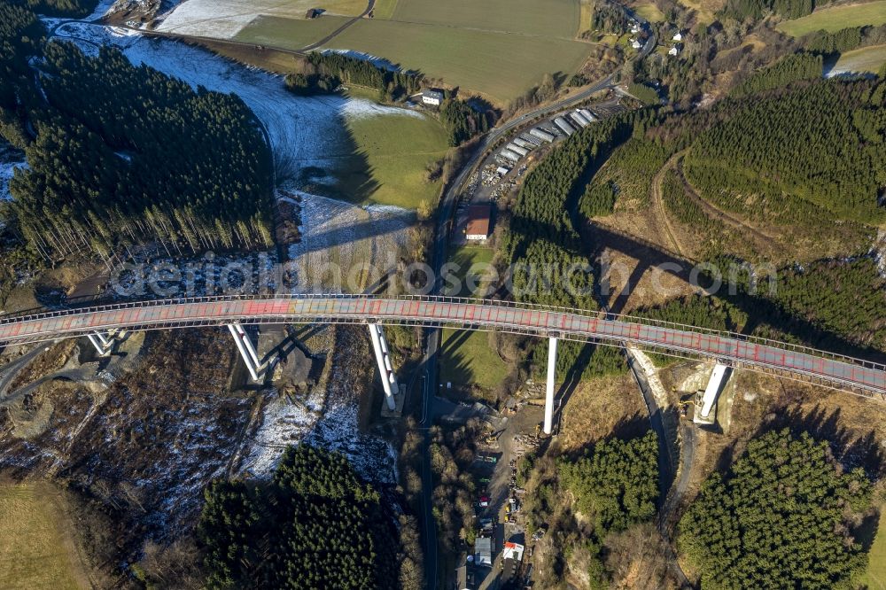 Bestwig from the bird's eye view: Viaduct Nuttlar under construction overlooking the municipality Bestwig in North Rhine-Westphalia