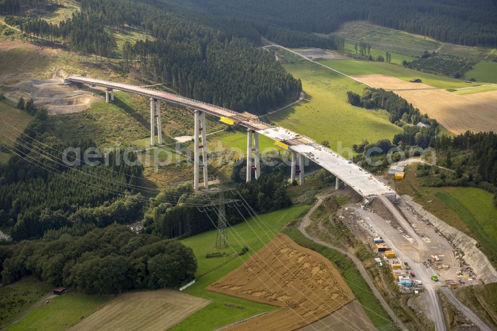 Bestwig from the bird's eye view: Viaduct Nuttlar under construction overlooking the municipality Bestwig in North Rhine-Westphalia