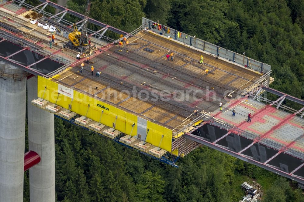 Bestwig from the bird's eye view: Viaduct Nuttlar under construction overlooking the municipality Bestwig in North Rhine-Westphalia