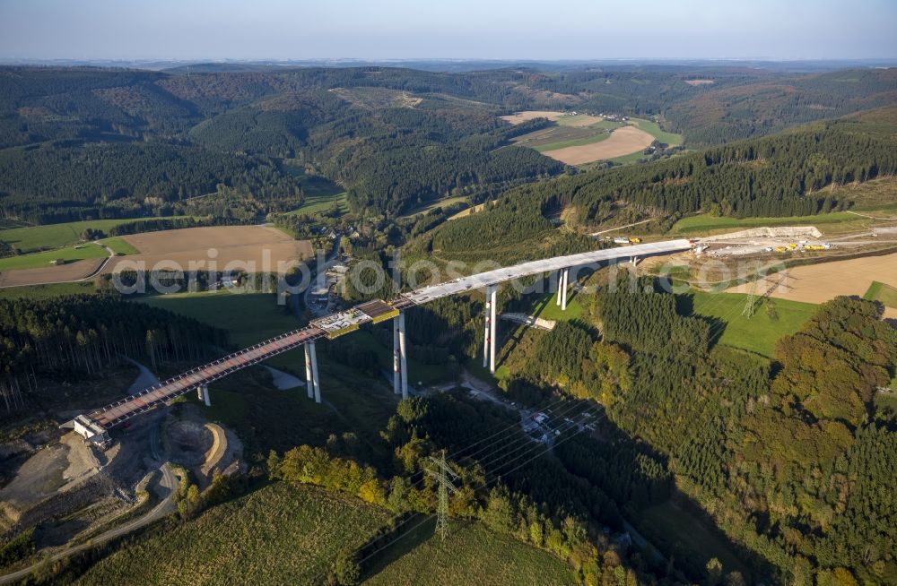 Bestwig from the bird's eye view: Viaduct Nuttlar under construction overlooking the municipality Bestwig in North Rhine-Westphalia