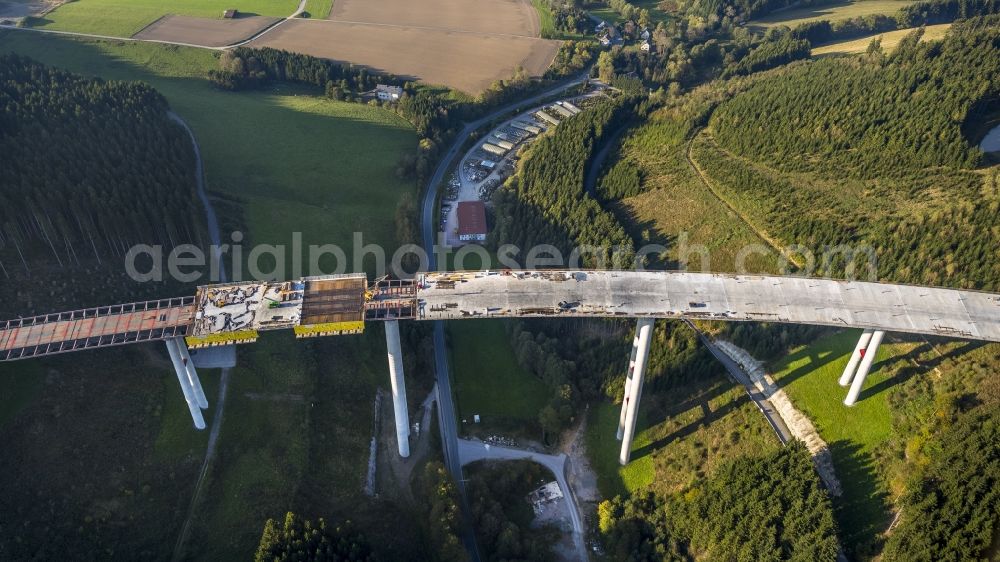 Aerial image Bestwig - Viaduct Nuttlar under construction overlooking the municipality Bestwig in North Rhine-Westphalia