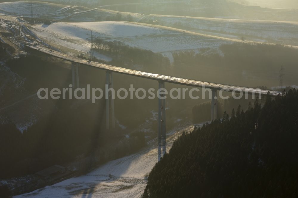 Bestwig from the bird's eye view: Viaduct Nuttlar under construction overlooking the municipality Bestwig in North Rhine-Westphalia