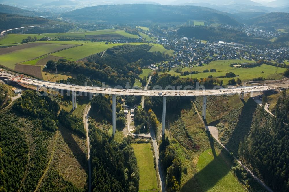 Bestwig from the bird's eye view: Viaduct Nuttlar under construction overlooking the municipality Bestwig in North Rhine-Westphalia