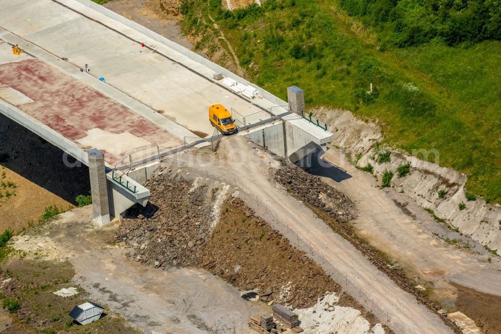 Bestwig from the bird's eye view: Viaduct Nuttlar under construction overlooking the municipality Bestwig in North Rhine-Westphalia