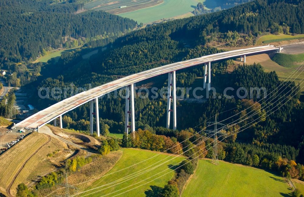 Bestwig from the bird's eye view: Viaduct Nuttlar under construction overlooking the municipality Bestwig in North Rhine-Westphalia