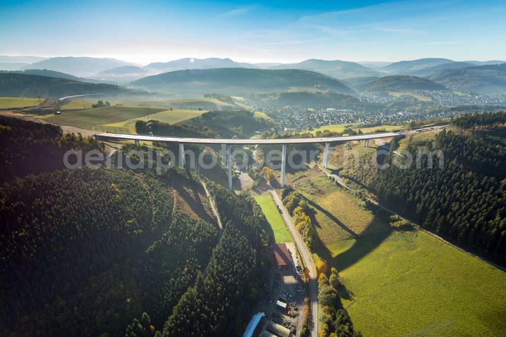 Bestwig from the bird's eye view: Viaduct Nuttlar under construction overlooking the municipality Bestwig in North Rhine-Westphalia