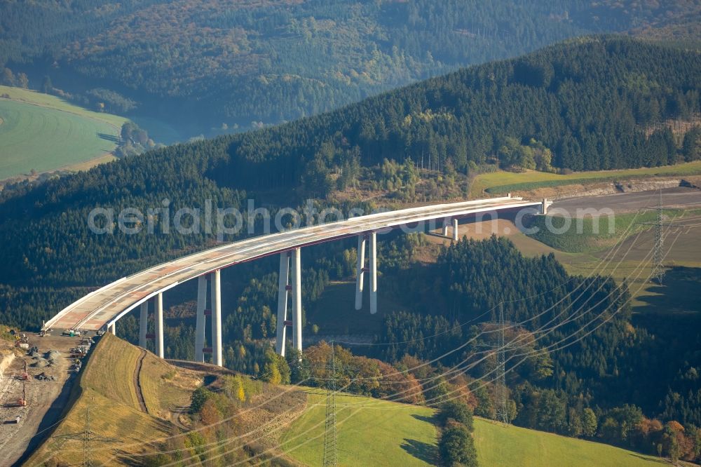 Bestwig from the bird's eye view: Viaduct Nuttlar under construction overlooking the municipality Bestwig in North Rhine-Westphalia