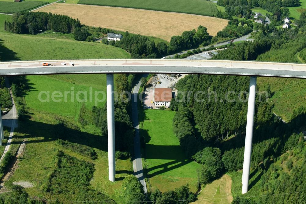 Bestwig from the bird's eye view: Viaduct Nuttlar under construction overlooking the municipality Bestwig in North Rhine-Westphalia